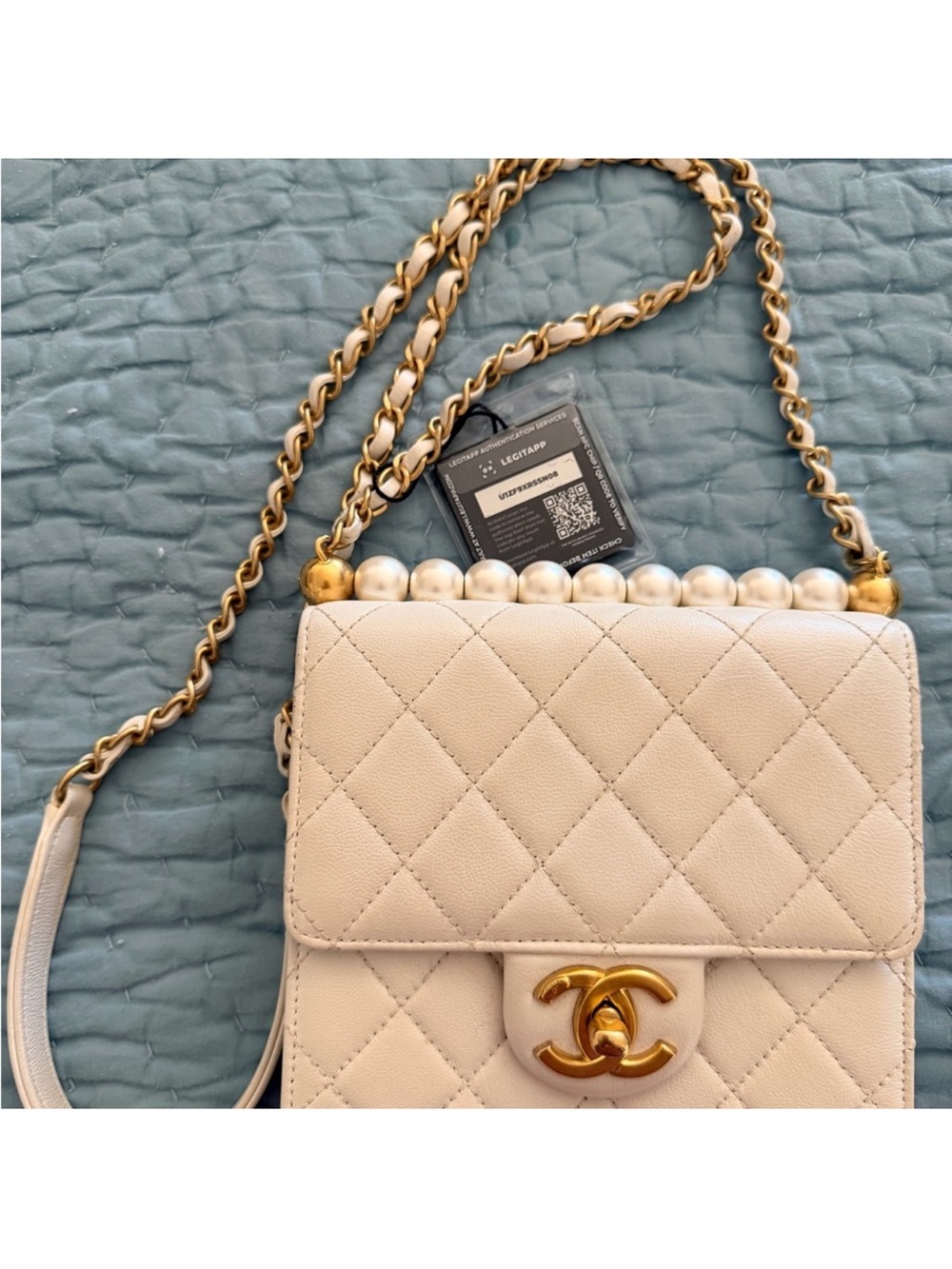 CHANEL White Quilted Leather Crossbody with Gold Chain Accent